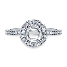 Round Diamond Halo Engagement Ring in Platinum